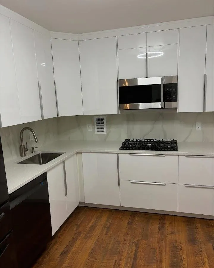 Restored kitchen with white cabinets after water damage in Pennsauken